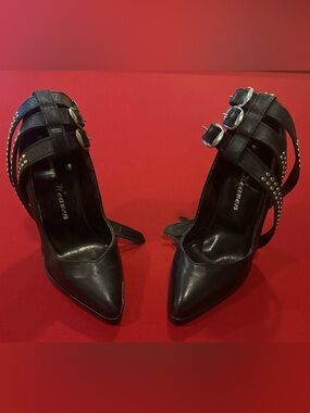 Ultra sexy black leather punk rock stilettos.